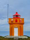 Iceland. Lighthouse Osholar, Bolungarvik at fjord Isafjardardjup during autumn. Art Print